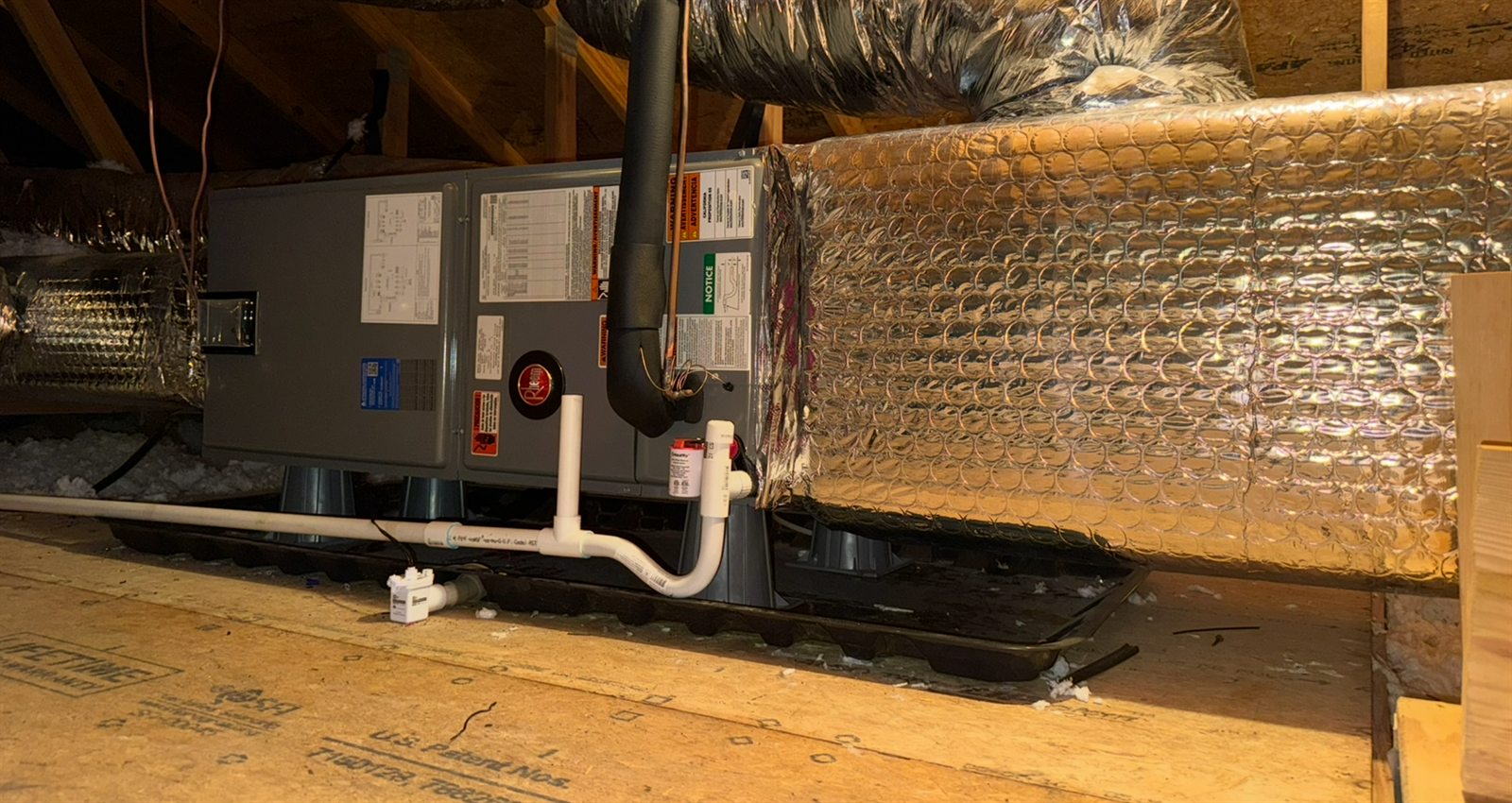 Rheem air handler and insulated ductwork installed in an attic