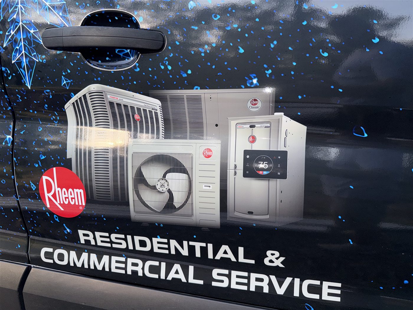 Rheem heating and cooling equipment displayed on an Ascend HVAC service vehicle